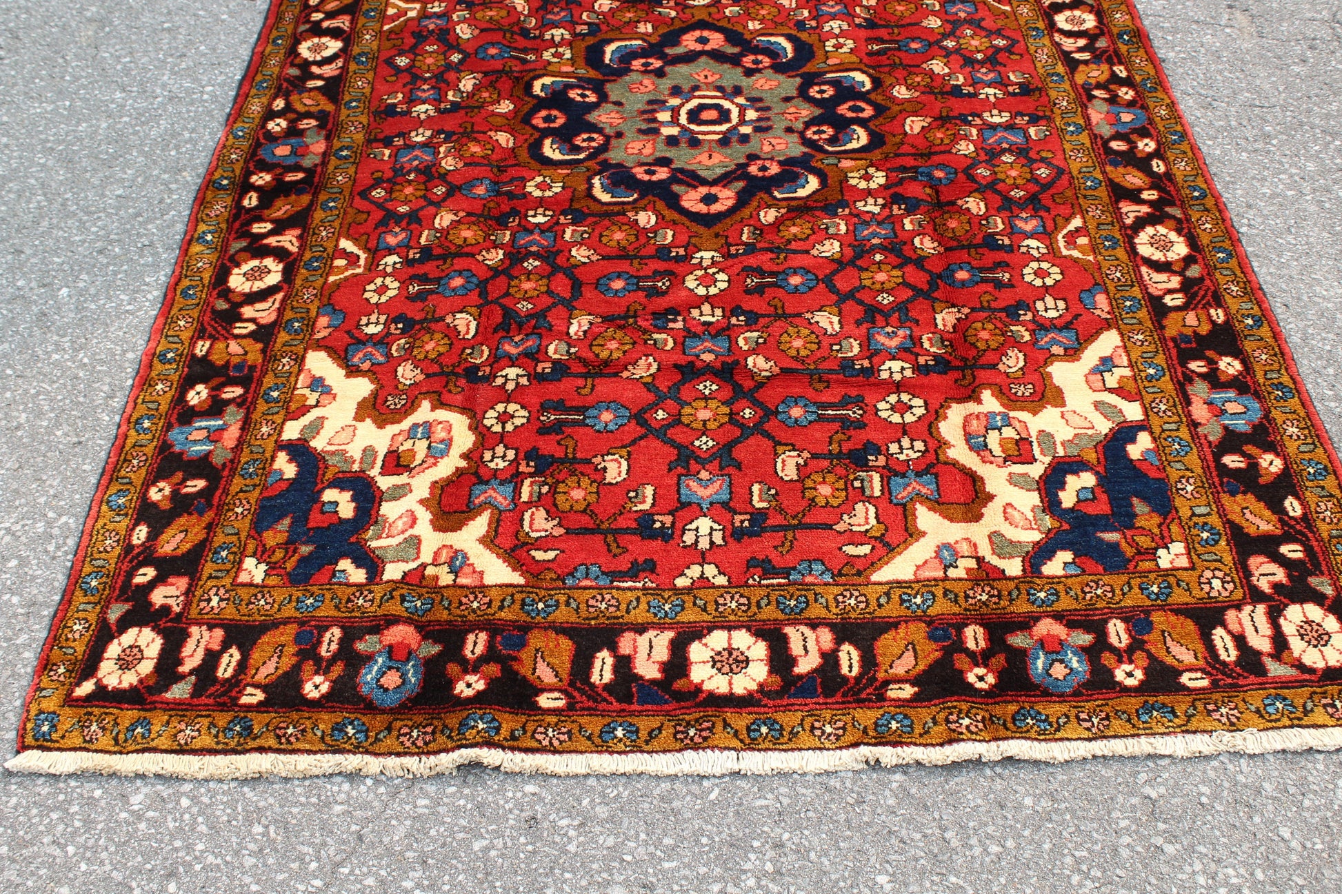 Red Oriental Rug with Navy Blue Border Yellow Accents | 4'7" x 7'7"