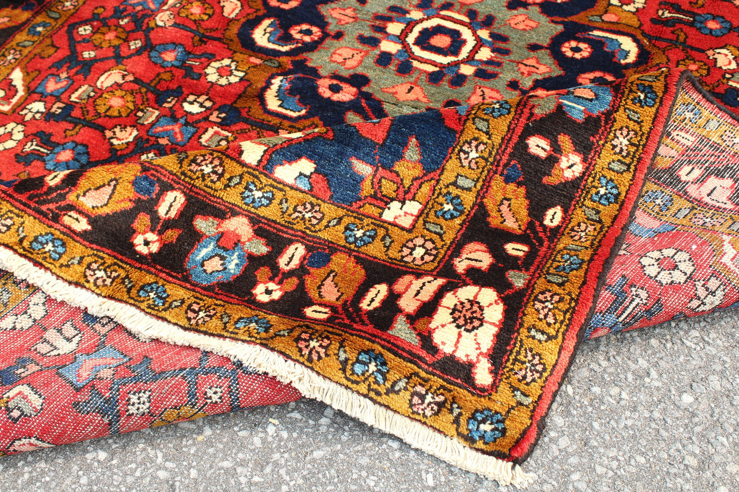 Red Oriental Rug with Navy Blue Border Yellow Accents | 4'7" x 7'7"