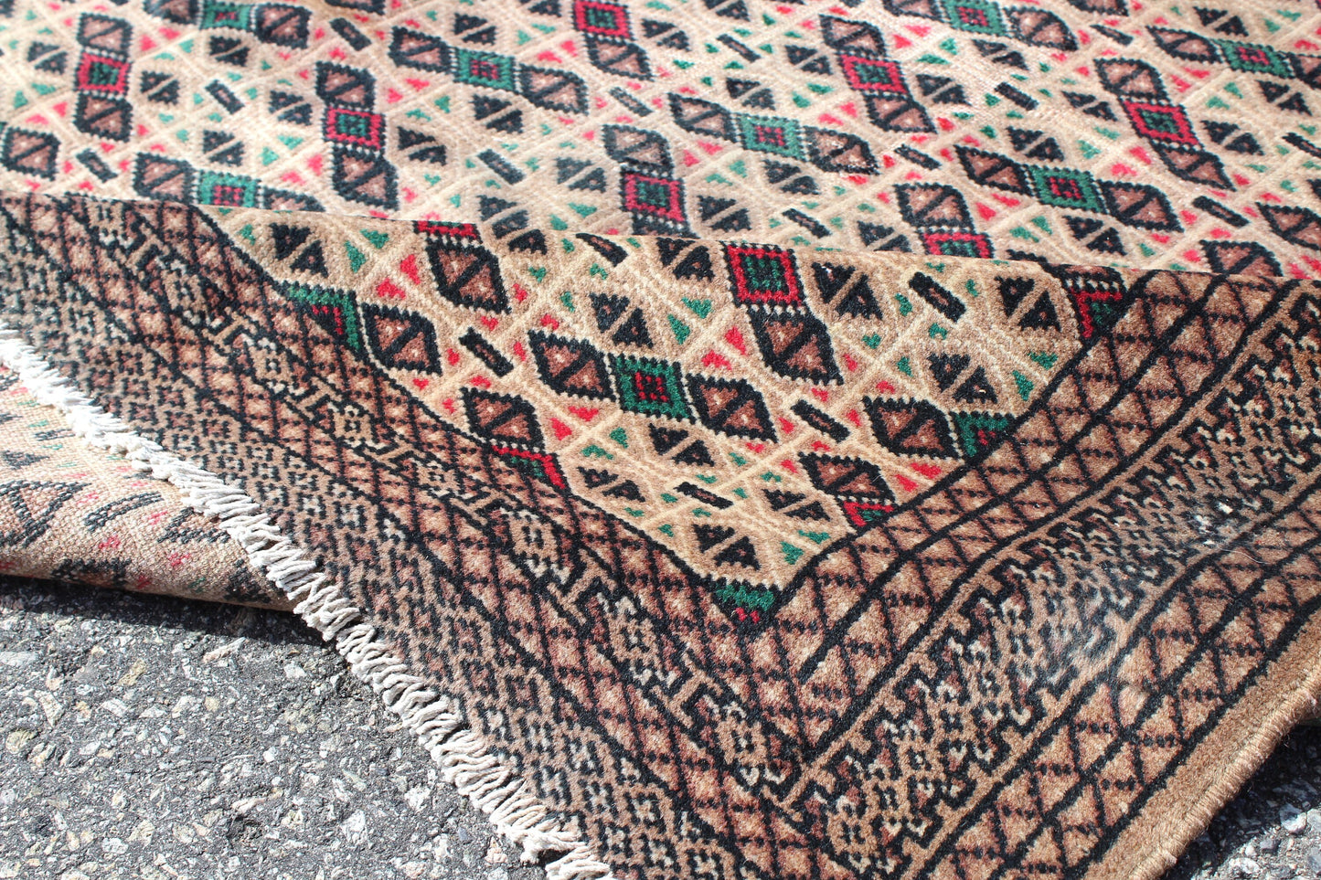 Cream Area Rug with Red Green Geometric Designs