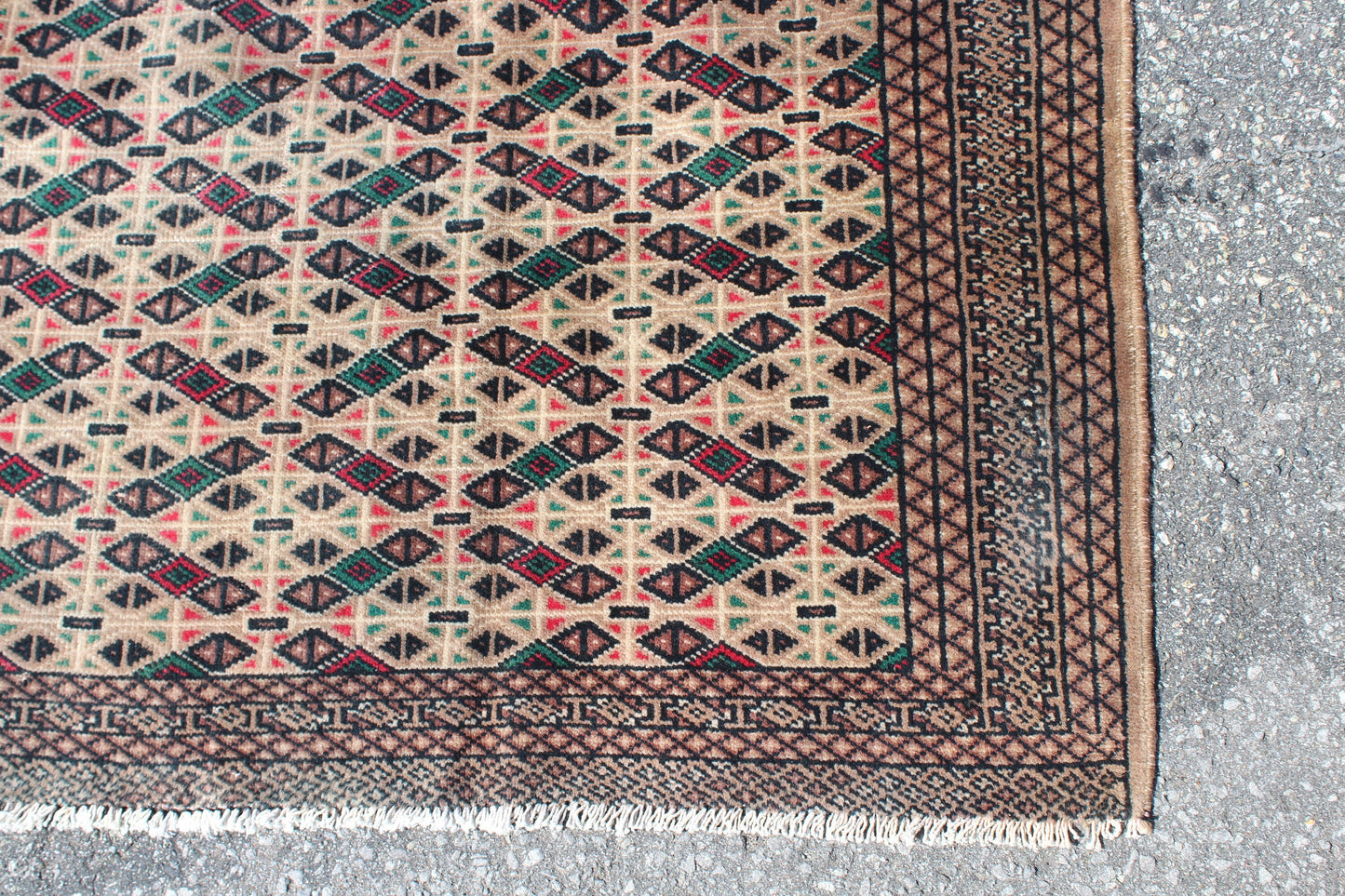 Cream Area Rug with Red Green Geometric Designs