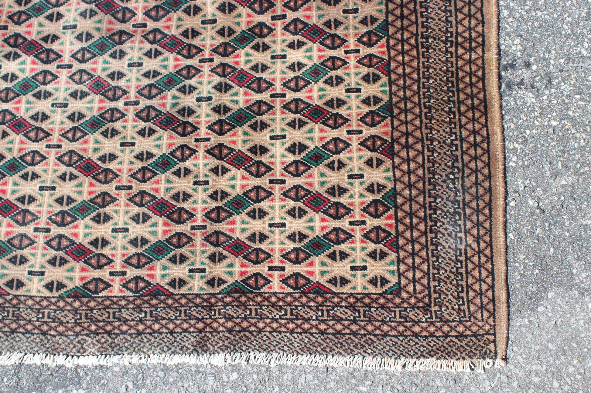 Cream Area Rug with Red Green Geometric Designs