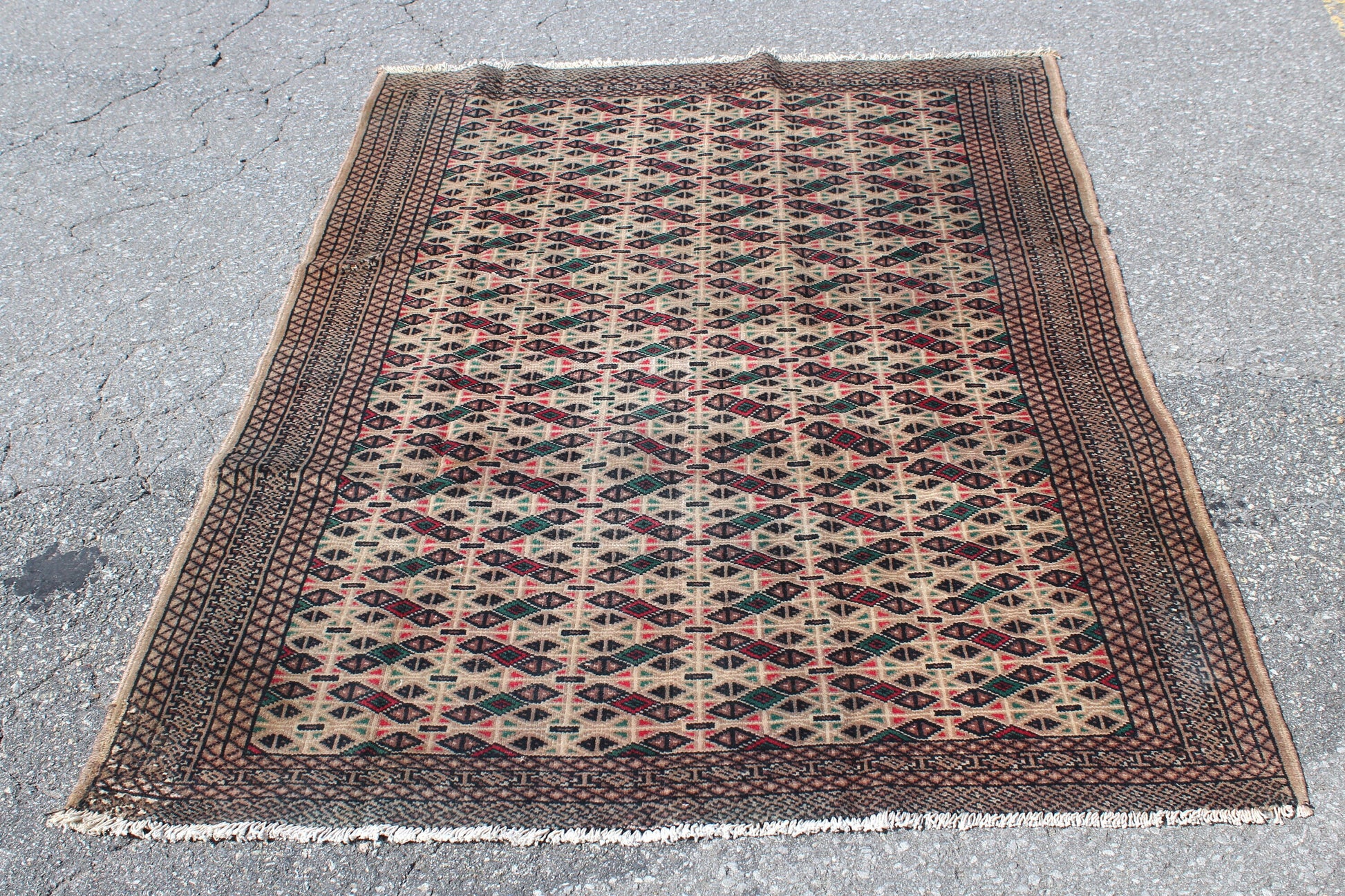 Cream Area Rug with Red Green Geometric Designs