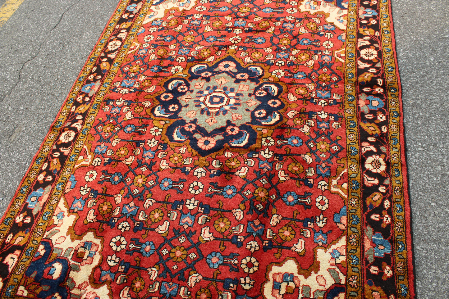 Red Oriental Rug with Navy Blue Border Yellow Accents | 4'7" x 7'7"