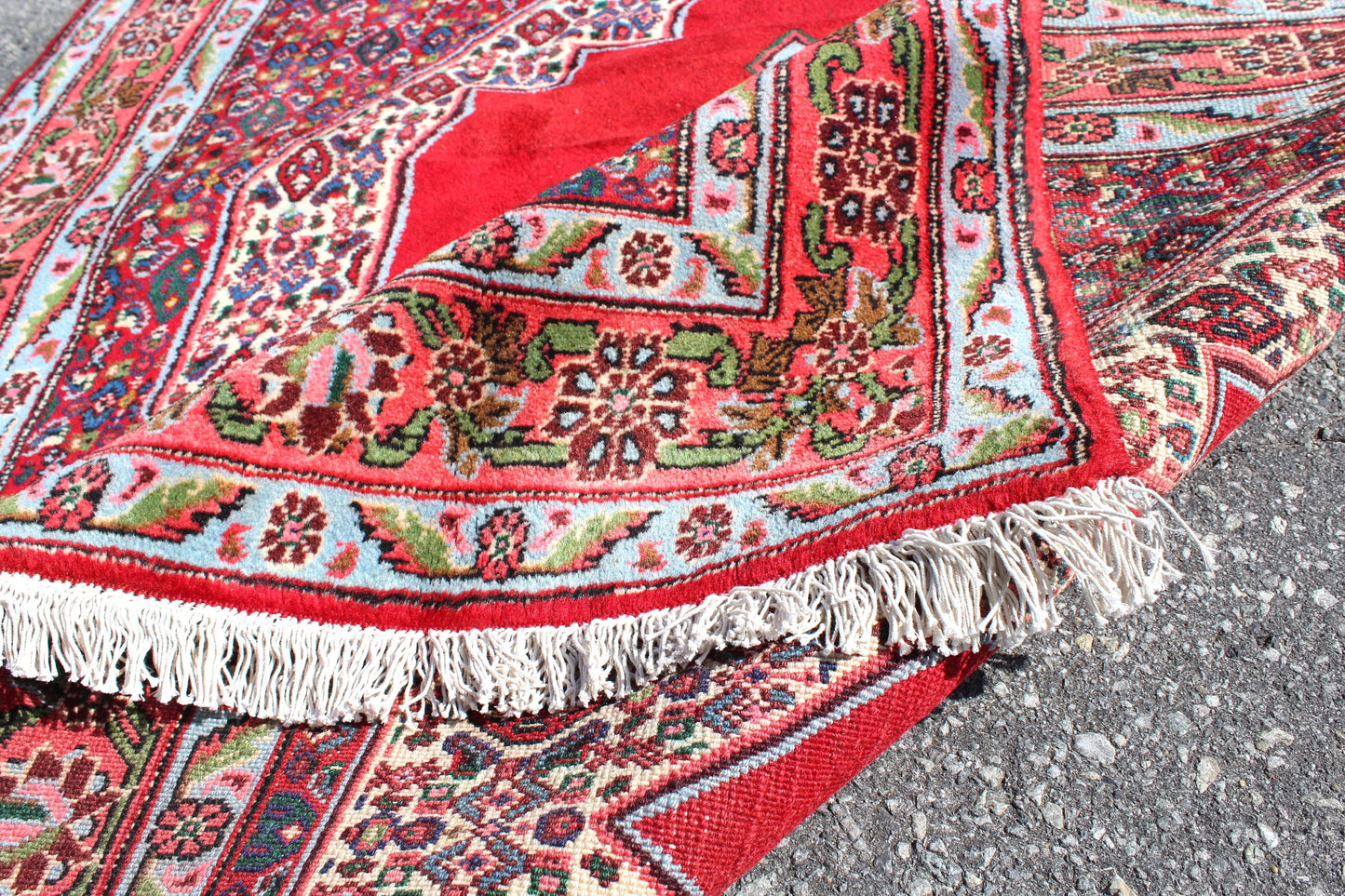 Blue Red rug with Bright Red Medallion 4' x 5'1"