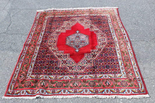 Blue Red rug with Bright Red Medallion 4' x 5'1"