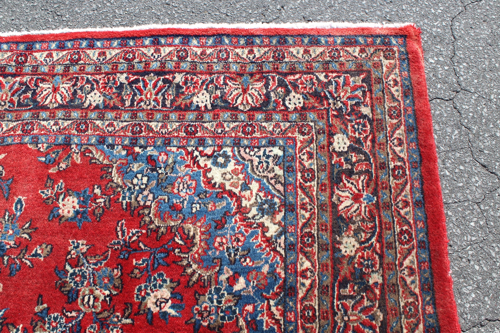 Red Oriental 7x10 Handmade Rug with Blue Borders
