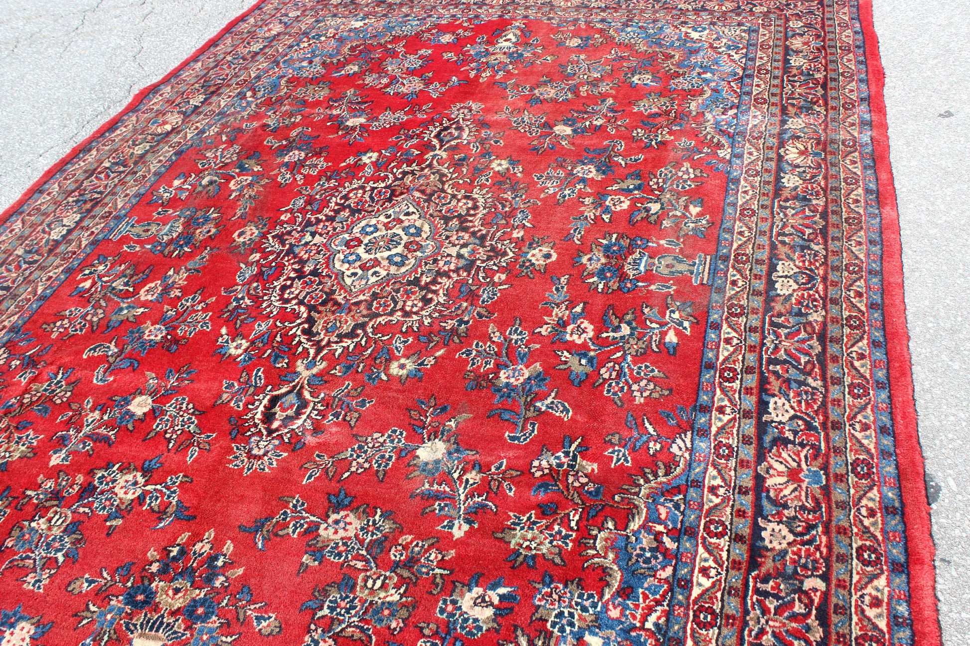 Red Oriental 7x10 Handmade Rug with Blue Borders