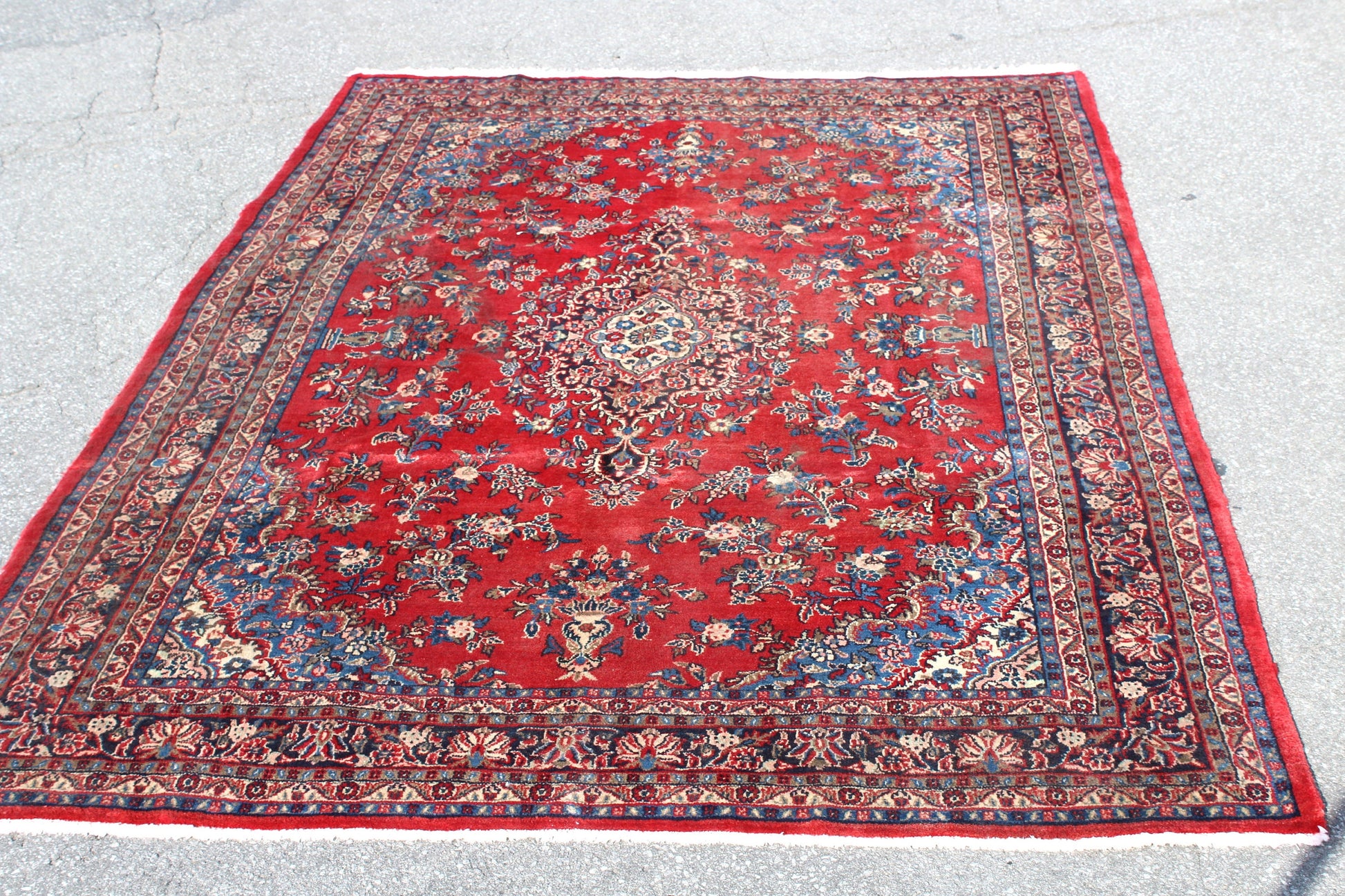 Red Oriental 7x10 Handmade Rug with Blue Borders